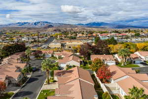 Aerial perspective of suburban area featuring mountains
