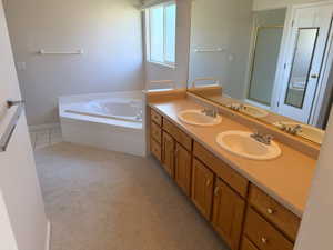 Primary Bath with garden tub, double vanity, and New Luxury Carpet