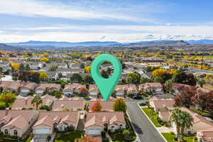 Aerial perspective of suburban area with mountains