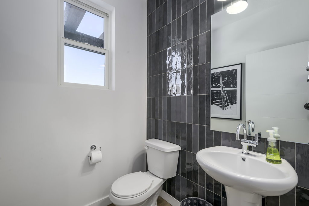 Perfectly sized and thoughtfully designed, this guest bath keeps things easy and elegant. *model