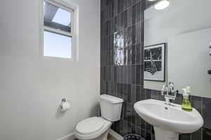 Perfectly sized and thoughtfully designed, this guest bath keeps things easy and elegant. *model