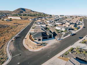 View of property location featuring a mountain backdrop and nearby suburban area