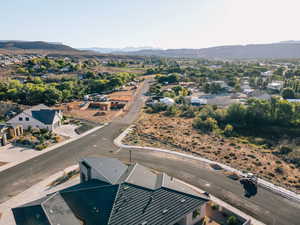 Aerial view of residential area featuring mountains