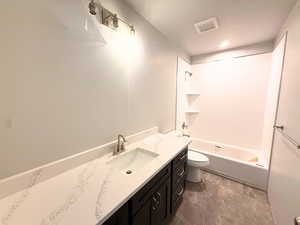 Bathroom featuring vanity and tub / shower combination