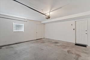 Garage featuring a garage door opener