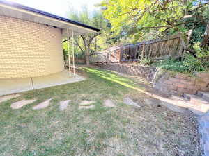 View of fenced backyard