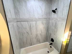 Bathroom featuring shower / bath combination