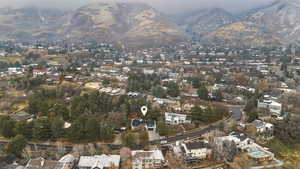 View of property location with mountains and nearby suburban area