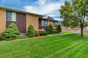 View of front of home featuring brick siding