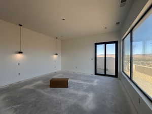 Spare room with concrete floors