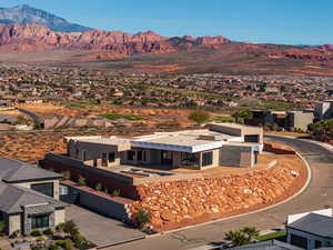 Aerial view of residential area with a mountainous background