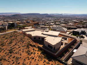 Aerial view of residential area with a mountainous background