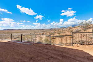 View of yard with a mountain view and a view of rural / pastoral area