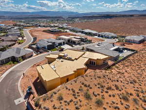 Aerial view of residential area with a mountainous background
