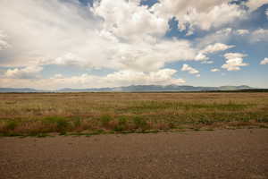 View of nature featuring rural landscape and a mountain backdrop