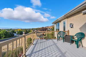 Trex type deck featuring a mountain view