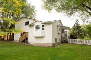 Back of house with stairs