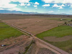 Overview of rural landscape with a mountainous background
