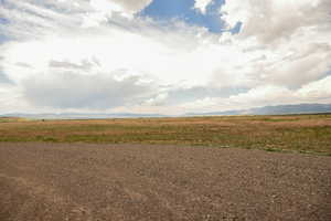 View of yard with a mountain view and a view of countryside