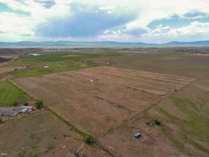 Overview of rural landscape with a mountain backdrop