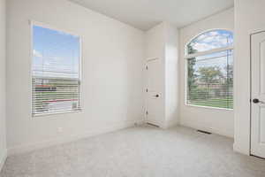 Front bedroom area that can be used as formal living area or den.  New carpet throughout.