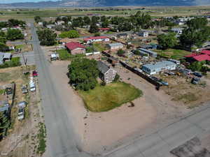 Aerial overview of property's location featuring a mountain backdrop