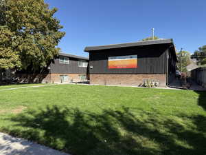 View of front of house featuring brick siding