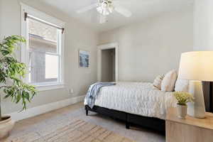 Bedroom featuring carpet flooring and ceiling fan