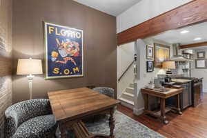 Office space featuring dark wood-style flooring and recessed lighting