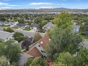Aerial view of residential area featuring a mountain backdrop