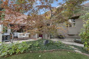 View of yard featuring a patio and an outdoor hangout area