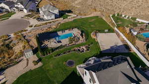 Aerial view of property's location featuring a pool area
