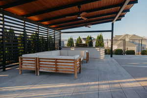 View of patio featuring a ceiling fan and outdoor lounge area