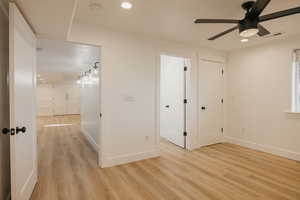 Bedroom #4 with full bathroom,  recessed lighting, light wood finished floors, a ceiling fan, and a smoke detector