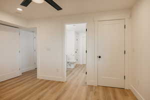 Bedroom #4 featuring access to attached full bathroom, light wood-style flooring, recessed lighting, and a ceiling fan