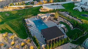 Aerial view of property's location featuring a pool