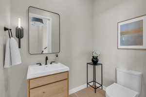 Bathroom featuring vanity and light wood-style flooring