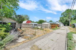 View of asphalt alley
