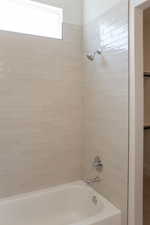Bathroom with shower / bathtub combination