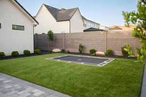 View of fenced backyard