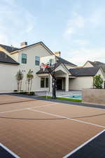 View of basketball court with community basketball court and a tennis court