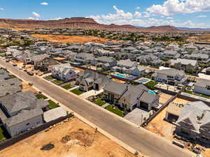 Aerial view of residential area with a mountain backdrop