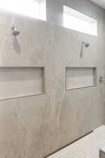 Bathroom with tiled shower