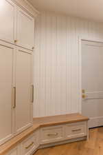 Mudroom with light wood-style flooring