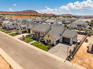 Aerial view of residential area featuring a mountain backdrop