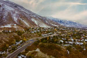 View of mountain background featuring nearby suburban area