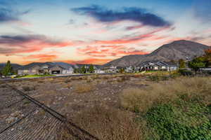 View of mountain backdrop with nearby suburban area