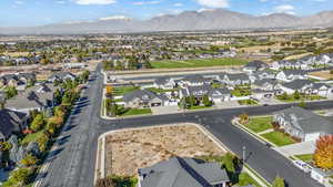 Aerial view of residential area with a mountain backdrop