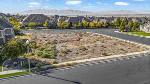 View of mountain backdrop with nearby suburban area