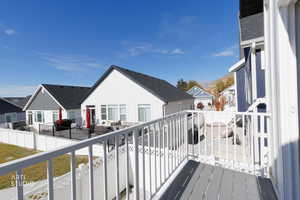 Balcony with a residential view and grilling area